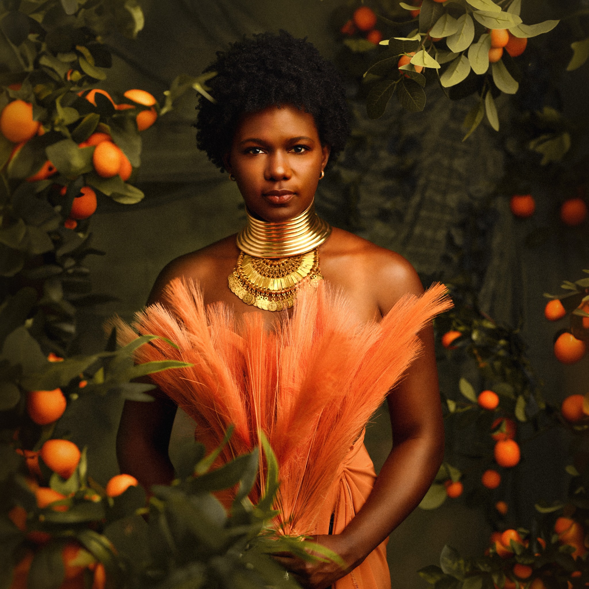 Close-up women’s empowerment portrait in an orange garden set